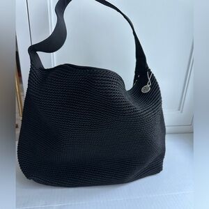 NWOT The  Sak Black Crocheted hobo bag. New, never been used. Clean interior.